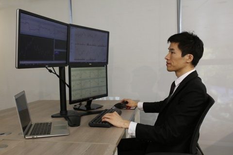 Trader With Four Monitors